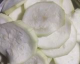 A picture of step 1 of Bottle gourd fritters.