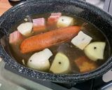 Une image de l'étape 12 de Potée au chou, saucisse de morteau, lard, carottes et navets.