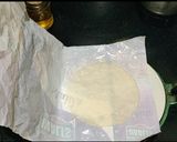 A picture of step 4 of Maida chapati with kurma.