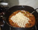 A picture of step 2 of Thumsup maggi.