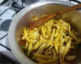 A picture of step 8 of Orange flavoured chips masala.