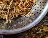 A picture of step 9 of Triple Schezwan fried rice.