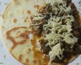 A picture of step 12 of Cheese chicken and veggies tortilla wrap.