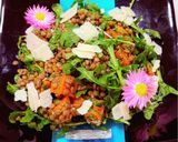 A picture of step 7 of Spiced sweet potato, puy lentil and rocket with honey and parmesan cheese.