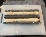 A picture of step 4 of Quick and Easy Baguettes - 2 1/2 hours and you're eating :P.