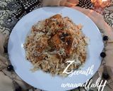 A picture of step 7 of Hyderabadi Chicken Sofiyani Kachchi Aqhni Dum Biryani.