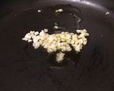 A picture of step 2 of Pan fry enokitake with bacon 🥓.
