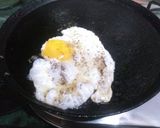A picture of step 2 of Half fry Egg with toast.