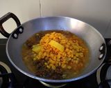 A picture of step 6 of Mudhi Ghanto (Fish head and ChickPea Curry.