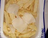 A picture of step 1 of Cheesy French fries.