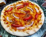 A picture of step 2 of Paneer and onion pizza.