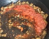 A picture of step 5 of Seafood Paella with Socarrat.