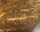 A picture of step 10 of Baked Tilapia Fish served with rocket leaves.