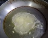 A picture of step 5 of Tarkay wali moong daal.