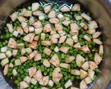A picture of step 1 of French Beans and Brinjal Curry.