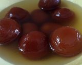 A picture of step 6 of Gulab Jamun with kesar Rabri.