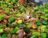 A picture of step 3 of Achari Bhindi Fry.