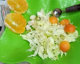 A picture of step 4 of Apple and Cabbage bowl fruit chat.