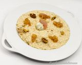 Foto del passaggio 7 della ricetta Risotto al Gorgonzola con Cipolle di Breme e Miele