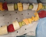 A picture of step 1 of Fruity 🍇🍎🍐🍒🍓🍌🍍🥝🍋🍊 frozen kebab skewers.😋😋.