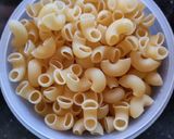 A picture of step 1 of Elbow Pasta with Veggies, Mushrooms,Cheesy Tomatoes, Rosemary.