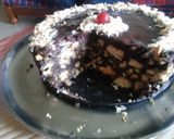 A picture of step 11 of Cherry Coco Biscuit Cake.
