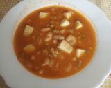 Foto del paso 12 de la receta: Alubias con calamar, gambas y almejas