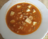 Foto del paso 12 de la receta: Alubias con calamar, gambas y almejas