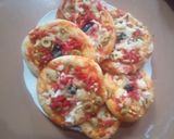 صورة لخطوة 7 من وصفة ميني بيتزا 😋💕🍕