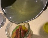 A picture of step 11 of Stuffed red chilli pickle.