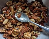 A picture of step 2 of Air fryer spicy sweet roasted nuts.