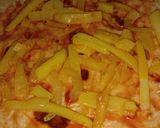 A picture of step 4 of Cheese potato fry Chapati roll.