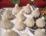 A picture of step 4 of Stuffed gulkand and coconut jaggery rava modak.
