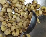 A picture of step 1 of Mashroom matar ki sabji.