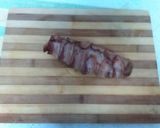 Foto del paso 3 de la receta: Medallones de cerdo albardados con reducción de PX y guarnición de calabacín con salsa holandesa