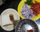 A picture of step 1 of Onion tomato grilled toast.