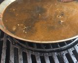 Foto del paso 3 de la receta: Arroz negro en barbacoa de gas weber o similar