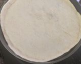 A picture of step 3 of Italian thin crust pizza.