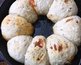 A picture of step 5 of Cheesy garlic bread meatball ring.