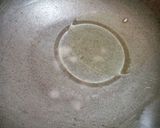 A picture of step 1 of Chicken khausay.