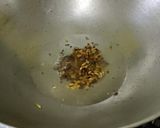 A picture of step 1 of Sweet & Sour Raw Mango & Jaggery.