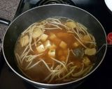 A picture of step 2 of Egg drop tofu soup.