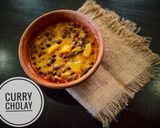 A picture of step 4 of Curry cholay.