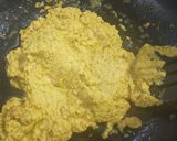 A picture of step 5 of Aam Kasundi with amchur powder.