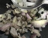 A picture of step 2 of Pulliyogre Rice.