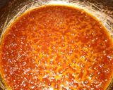 A picture of step 3 of Jollof Rice & Beans, wif salad.