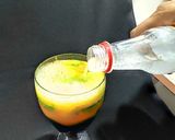A picture of step 3 of Devil's Knight Layered Mocktail.