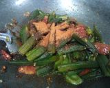 A picture of step 3 of Spicy schezwan bhindi.