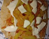 A picture of step 4 of Cheese potato fry Chapati roll.