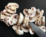 Foto del paso 4 de la receta Medallón de solomillo de pavo con champiñón al ajillo